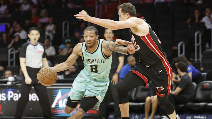 Mar 23, 2025; Miami, Florida, USA; Charlotte Hornets guard Nick Smith Jr. (8) is defended by Miami Heat forward Duncan Robinson (55) during the first half at Kaseya Center. Mandatory Credit: Rhona Wise-Imagn Images Mar 23, 2025; Miami, Florida, USA; Charlotte Hornets guard Nick Smith Jr. (8) is defended by Miami Heat forward Duncan Robinson (55) during the first half at Kaseya Center. Mandatory Credit: Rhona Wise-Imagn Images