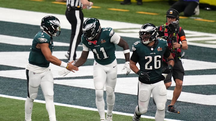 Feb 9, 2025; New Orleans, LA, USA; Philadelphia Eagles wide receiver A.J. Brown (11) reacts with quarterback Jalen Hurts (1) after making a touchdown catch against the Kansas City Chiefs during the second quarter in Super Bowl LIX at Caesars Superdome. Mandatory Credit: Kirby Lee-Imagn Images Feb 9, 2025; New Orleans, LA, USA; Philadelphia Eagles wide receiver A.J. Brown (11) reacts with quarterback Jalen Hurts (1) after making a touchdown catch against the Kansas City Chiefs during the second quarter in Super Bowl LIX at Caesars Superdome. Mandatory Credit: Kirby Lee-Imagn Images