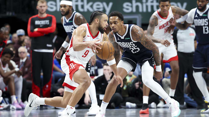 Oct 31, 2024; Dallas, Texas, USA; Houston Rockets forward Dillon Brooks (9) controls the ball as Dallas Mavericks forward P.J. Washington (25) defends during the second half at American Airlines Center. Mandatory Credit: Kevin Jairaj-Imagn Images Oct 31, 2024; Dallas, Texas, USA; Houston Rockets forward Dillon Brooks (9) controls the ball as Dallas Mavericks forward P.J. Washington (25) defends during the second half at American Airlines Center. Mandatory Credit: Kevin Jairaj-Imagn Images