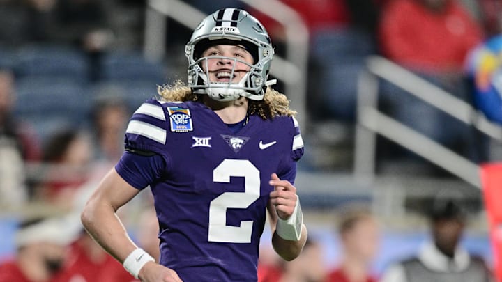 Kansas State quarterback Avery Johnson (2) smiles during the 2023 Pop-Tarts Bowl in Orlando, Fla. on Thursday, Dec. 28, 2023 at Camping World Stadium. Mandatory Credit: Julio Aguilar/Getty Images Kansas State quarterback Avery Johnson (2) smiles during the 2023 Pop-Tarts Bowl in Orlando, Fla. on Thursday, Dec. 28, 2023 at Camping World Stadium. Mandatory Credit: Julio Aguilar/Getty Images