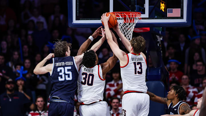 Nov 9, 2024; Tucson, Arizona, USA; Old Dominion Monarchs forward Caelum Swanton-Rodger (35), Arizona Wildcats forward Tobe Awaka (30) and Arizona Wildcats forward Henri Veesaar (13) all reach for the rebound during the second half at McKale Center. Mandatory Credit: Aryanna Frank-Imagn Images