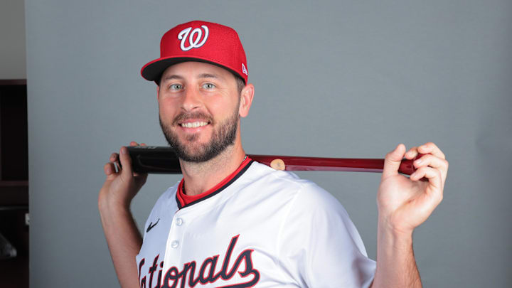 Feb 21, 2025; West Palm Beach, FL, USA; Washington Nationals shortstop Paul DeJong (14) poses for a photo during picture day at CACTI Park of the Palm Beaches. Mandatory Credit: Sam Navarro-Imagn Images