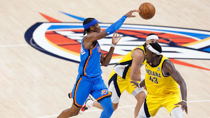 Jun 22, 2025; Oklahoma City, Oklahoma, USA; Oklahoma City Thunder guard Shai Gilgeous-Alexander (2) passes the ball while Indiana Pacers forward Pascal Siakam (43) defends during the first half of game seven of the 2025 NBA Finals at Paycom Center. Mandatory Credit: Alonzo Adams-Imagn Images Jun 22, 2025; Oklahoma City, Oklahoma, USA; Oklahoma City Thunder guard Shai Gilgeous-Alexander (2) passes the ball while Indiana Pacers forward Pascal Siakam (43) defends during the first half of game seven of the 2025 NBA Finals at Paycom Center. Mandatory Credit: Alonzo Adams-Imagn Images