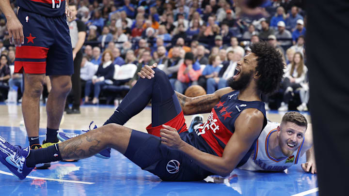 Dec 23, 2024; Oklahoma City, Oklahoma, USA; Washington Wizards forward Marvin Bagley III (35) reacts after a potential injury to his right leg after a play against the Oklahoma City Thunder during the second half at Paycom Center. Mandatory Credit: Alonzo Adams-Imagn Images