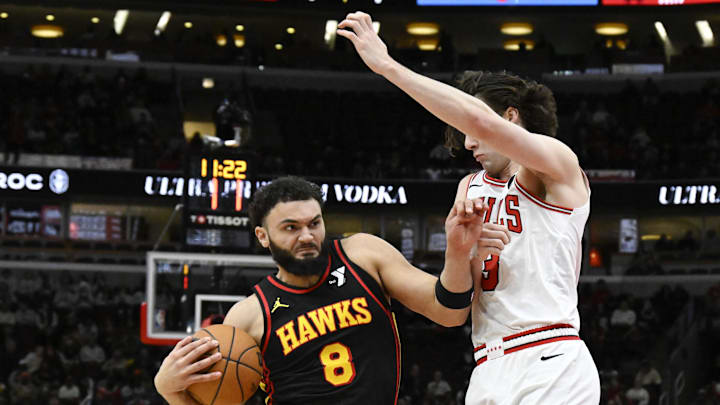 Jan 15, 2025; Chicago, Illinois, USA;  Atlanta Hawks forward David Roddy (8) drives to the basket against Chicago Bulls guard Josh Giddey (3) during the second half at the United Center. Mandatory Credit: Matt Marton-Imagn Images