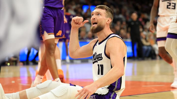 Mar 14, 2025; Phoenix, Arizona, USA; Sacramento Kings forward Domantas Sabonis (11) reacts against the Phoenix Suns during the second half at Footprint Center. Mandatory Credit: Mark J. Rebilas-Imagn Images