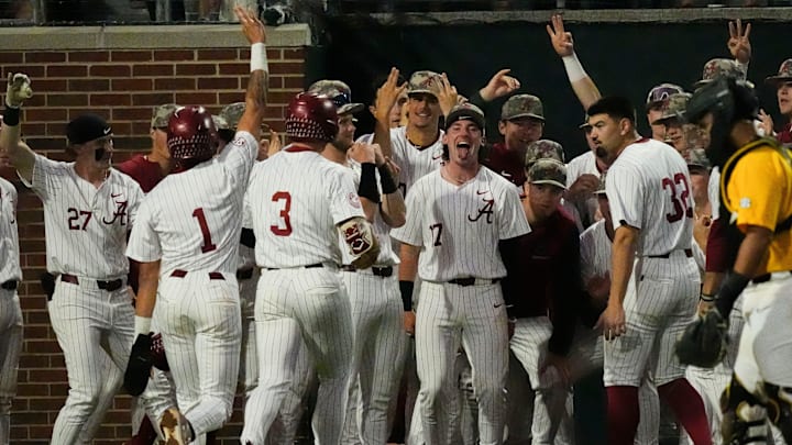 Apr 25, 2025; Tuscaloosa, AL, USA; Alabama players greet Kade Snell after he hit a two-run homer against Missouri at Sewell-Thomas Stadium Friday night.