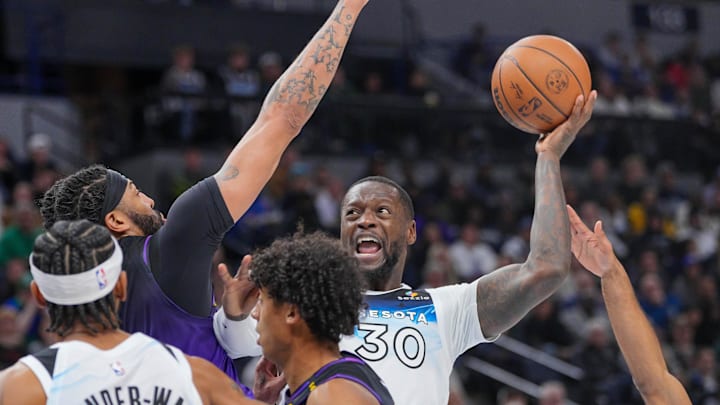 Dec 2, 2024; Minneapolis, Minnesota, USA; Minnesota Timberwolves forward Julius Randle (30) shoots against the Los Angeles Lakers in the third quarter at Target Center. Mandatory Credit: Brad Rempel-Imagn Images