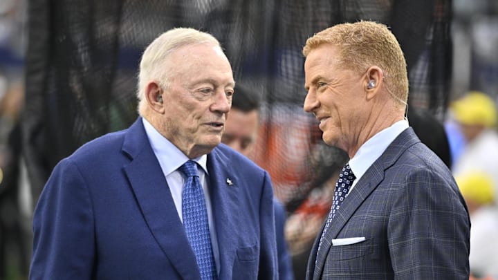 Dallas Cowboys owner Jerry Jones and NBC commentator Jason Garrett speak before the game against the Green Bay Packers 