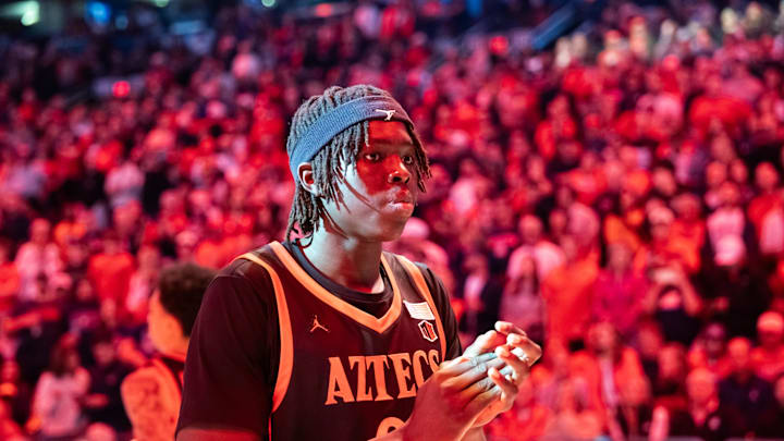 Dec 20, 2025; Phoenix, Arizona, USA; San Diego State Aztecs forward Magoon Gwath (0) against the Arizona Wildcats during the Hall of Fame Series at Mortgage Matchup Center.