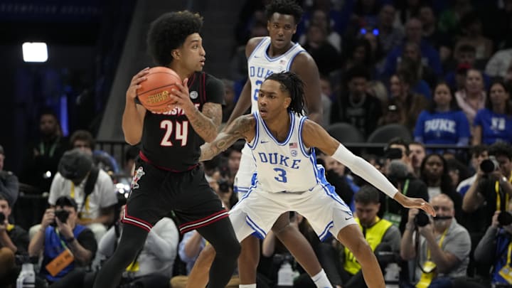 Mar 15, 2025; Charlotte, NC, USA; Duke basketball guard Isaiah Evans (3) guards Louisville Cardinals guard Chucky Hepburn (24) in the first half of the 2025 ACC Conference Championship game at Spectrum Center.