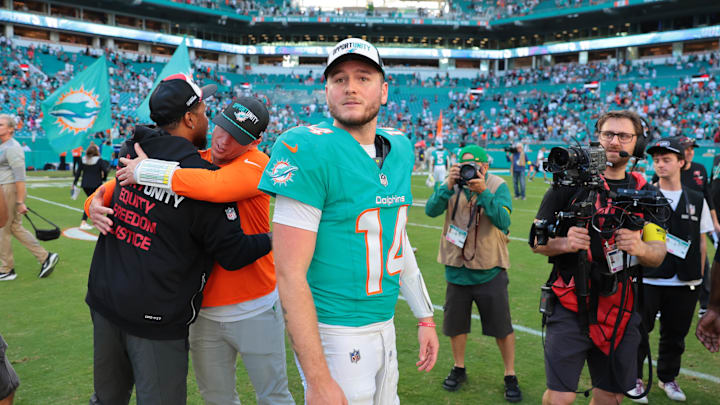 Miami Dolphins quarterback Quinn Ewers (14) stands on the field following a game against the Tampa Bay Buccaneers at Hard Rock Stadium. 