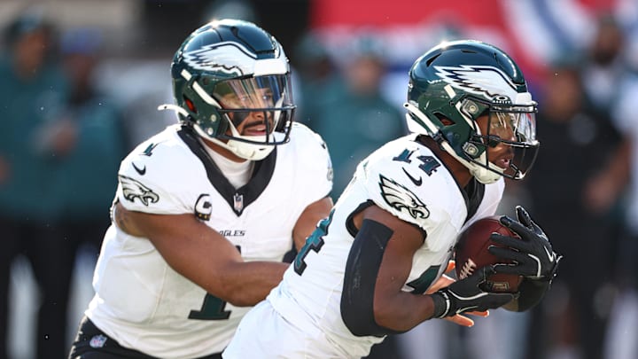 Oct 20, 2024; East Rutherford, New Jersey, USA; Philadelphia Eagles quarterback Jalen Hurts (1) hands off to running back Kenneth Gainwell (14) during the second half against the New York Giants at MetLife Stadium. Oct 20, 2024; East Rutherford, New Jersey, USA; Philadelphia Eagles quarterback Jalen Hurts (1) hands off to running back Kenneth Gainwell (14) during the second half against the New York Giants at MetLife Stadium.