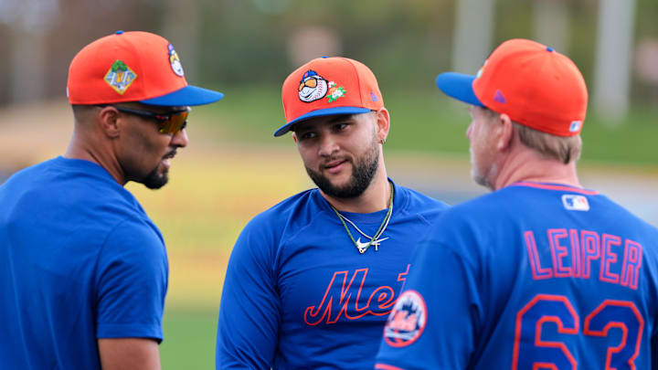 Feb 17, 2026; Port St. Lucie, FL, USA; New York Mets infielder Bo Bichette (center) speaks to infielder Marcus Semien (left) and third base coach Tim Leiper (right) during spring training at Clover Park. Mandatory Credit: Sam Navarro-Imagn Images Feb 17, 2026; Port St. Lucie, FL, USA; New York Mets infielder Bo Bichette (center) speaks to infielder Marcus Semien (left) and third base coach Tim Leiper (right) during spring training at Clover Park. Mandatory Credit: Sam Navarro-Imagn Images