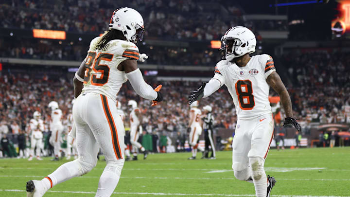 Dec 28, 2023; Cleveland, Ohio, USA; Cleveland Browns wide receiver Elijah Moore (8) celebrates with tight end David Njoku (85).