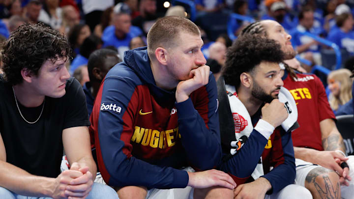 May 18, 2025; Oklahoma City, Oklahoma, USA; Denver Nuggets center Nikola Jokic (15) watches the final minutes of a game against the Oklahoma City Thunder from the bench in the fourth quarter during game seven of the second round for the 2025 NBA Playoffs at Paycom Center. Mandatory Credit: Alonzo Adams-Imagn Images