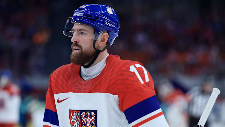 Feb 15, 2026; Milan, Italy; Filip Hronek of Czech Republic against Switzerland in men's ice hockey group A play during the Milano Cortina 2026 Olympic Winter Games at Milano Santagiulia Ice Hockey Arena. Mandatory Credit: Katie Stratman-Imagn Images
