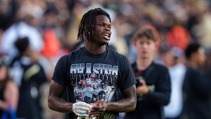 Sep 16, 2023; Boulder, Colorado, USA; Colorado Buffaloes cornerback Travis Hunter (12) warms up prior to the game against the Colorado State Rams at Folsom Field. Mandatory Credit: Andrew Wevers-Imagn Images