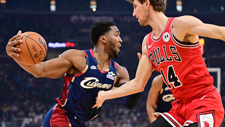 Nov 8, 2025; Cleveland, Ohio, USA; Cleveland Cavaliers guard Donovan Mitchell (45) drives to the basket against Chicago Bulls forward Matas Buzelis (14) during the first half at Rocket Arena. Mandatory Credit: Ken Blaze-Imagn Images Nov 8, 2025; Cleveland, Ohio, USA; Cleveland Cavaliers guard Donovan Mitchell (45) drives to the basket against Chicago Bulls forward Matas Buzelis (14) during the first half at Rocket Arena. Mandatory Credit: Ken Blaze-Imagn Images