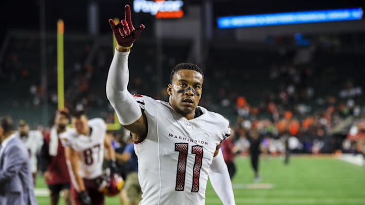 Sep 23, 2024; Cincinnati, Ohio, USA; Washington Commanders safety Jeremy Chinn (11) acknowledges fans after the victory over the Cincinnati Bengals at Paycor Stadium. Mandatory Credit: Katie Stratman-Imagn Images