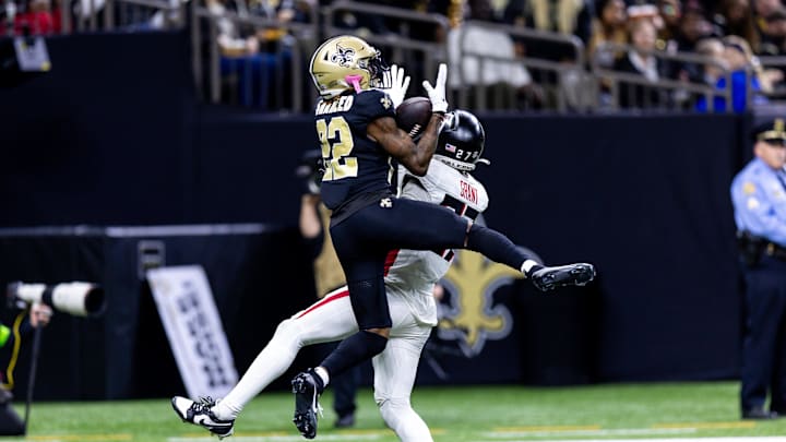 Jan 7, 2024; New Orleans, Louisiana, USA; New Orleans Saints wide receiver Rashid Shaheed (22) makes a touchdown reception against Atlanta Falcons safety Richie Grant (27) during the second half at Caesars Superdome. Mandatory Credit: Stephen Lew-Imagn Images Jan 7, 2024; New Orleans, Louisiana, USA; New Orleans Saints wide receiver Rashid Shaheed (22) makes a touchdown reception against Atlanta Falcons safety Richie Grant (27) during the second half at Caesars Superdome. Mandatory Credit: Stephen Lew-Imagn Images