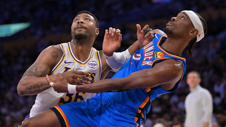 May 9, 2026; Los Angeles, California, USA; Los Angeles Lakers guard Marcus Smart (36) and Oklahoma City Thunder guard Shai Gilgeous-Alexander (2) fight for position on the court in the first half of game three of the second round of the 2026 NBA Playoffs at Crypto.com Arena. Mandatory Credit: Jayne Kamin-Oncea-Imagn Images