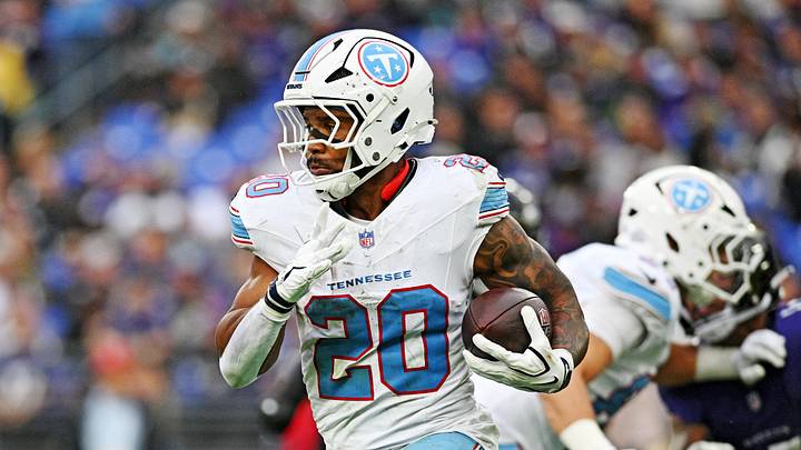 Oct 4, 2026; Baltimore, Maryland, USA;  Tennessee Titans running back Tony Pollard (20) runs the ball during the third quarter against the Baltimore Ravens at M&T Bank Stadium.  Mandatory Credit: Tommy Gilligan-Imagn Images