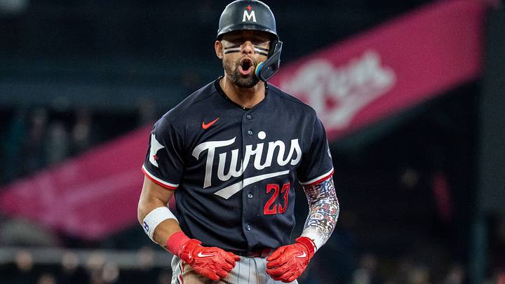 Twins first baseman Royce Lewis (23) celebrates while rounding the bases after hitting a three-run home run against the Seattle Mariners Twins first baseman Royce Lewis (23) celebrates while rounding the bases after hitting a three-run home run against the Seattle Mariners