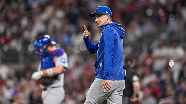 May 13, 2026; Cumberland, Georgia, USA; Chicago Cubs manager Craig Counsell (11) walks to the mound to change pitchers against the Atlanta Braves during the eighth inning at Truist Park. Mandatory Credit: Dale Zanine-Imagn Images