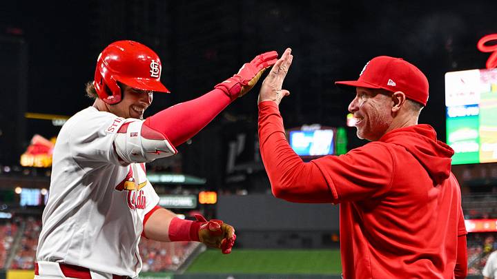 Mar 30, 2026; St. Louis, Missouri, USA; St. Louis Cardinals third baseman Nolan Gorman (16) is congratulated by hitting coach Brant Brown (73) after hitting a solo home run against the New York Mets during the sixth inning at Busch Stadium. Mandatory Credit: Jeff Curry-Imagn Images