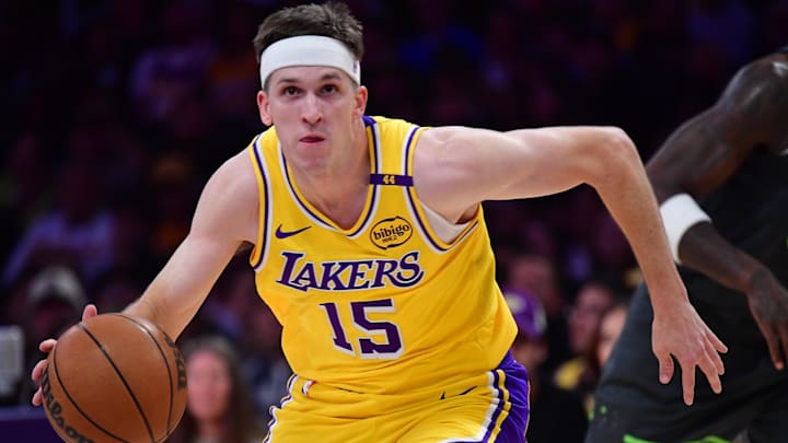 Apr 30, 2025; Los Angeles, California, USA; Los Angeles Lakers guard Austin Reaves (15) moves to the basket against the Minnesota Timberwolves during the first half in game five of first round for the 2025 NBA Playoffs at Crypto.com Arena. Mandatory Credit: Gary A. Vasquez-Imagn Images