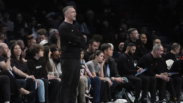 Apr 6, 2025; Brooklyn, New York, USA; Toronto Raptors head coach Darko Rajakovic speaks to his players on the court during the first half against the Brooklyn Nets at Barclays Center. Mandatory Credit: Gregory Fisher-Imagn Images