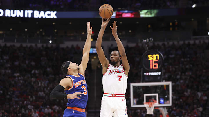 Mar 31, 2026; Houston, Texas, USA; Houston Rockets forward Kevin Durant (7) shoots the ball as New York Knicks guard Josh Hart (3) defends during the second quarter at Toyota Center. Mandatory Credit: Troy Taormina-Imagn Images