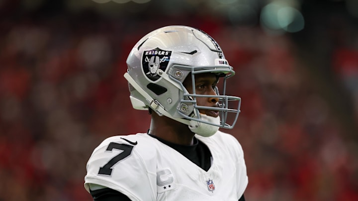 Dec 21, 2025; Houston, Texas, USA ;Las Vegas Raiders quarterback Geno Smith (7) warms up on the sidelines before his first series against the Houston Texans in the first quarter at NRG Stadium. Mandatory Credit: Thomas Shea-Imagn Images