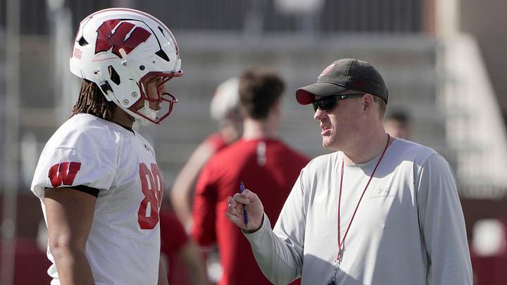 Wisconsin assistant head coach/tight ends Nate Letton talks with tight end Jacob Harris (89) is shown during spring football practice Tuesday, April 21, 2026 at Camp Randall Stadium in Madison, Wisconsin.