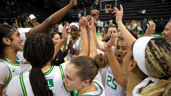 The Oregon women's basketball team celebrates its victory over California Baptist University at Matthew Knight Arena in Eugene on Monday, Nov. 4, 2024.