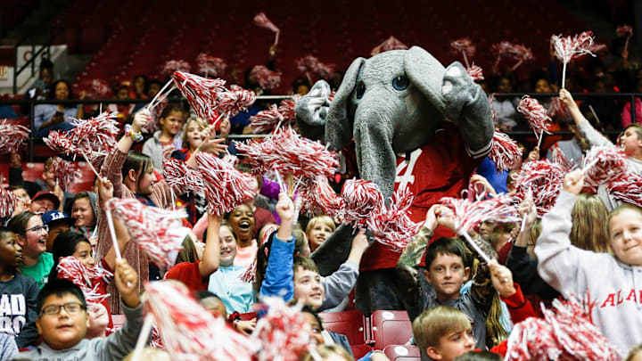 Big Al cheers with students from Huntington Place Elementary School during the annual Fifth Grade Day hosted by the Alabama women's basketball team as they played Bethune-Cookman Monday, Dec. 17, 2019. [Staff Photo/Gary Cosby Jr.]