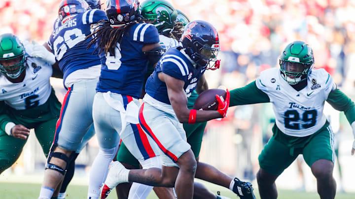 Dec 20, 2025; Oxford, MS, USA; Mississippi Rebels running back Kewan Lacy (5) carries the ball for a touchdown against the Tulane Green Wave during the first half of a game at Vaught-Hemingway Stadium. Mandatory Credit: Petre Thomas-Imagn Images