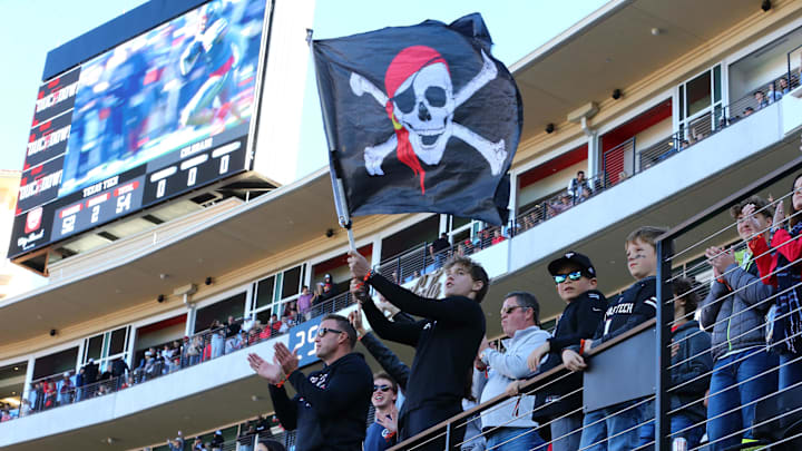 Nov 9, 2024; Lubbock, Texas, USA; A young Texas Tech Red Raiders fan in the stands during the first half during the game against the Colorado Buffalos at Jones AT&T Stadium and Cody Campbell Field. Mandatory Credit: Michael C. Johnson-Imagn Images