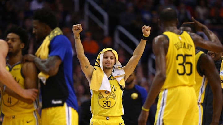 Dec 31, 2018; Phoenix, AZ, USA; Golden State Warriors guard Stephen Curry (30) celebrates in the second half against the Phoenix Suns in the second half at Talking Stick Resort Arena. Mandatory Credit: Mark J. Rebilas-Imagn Images