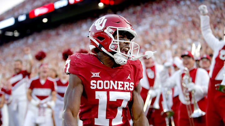 OU receiver Marvin Mims celebrates a touchdown in the second quarter of a 33-3 win against Kent