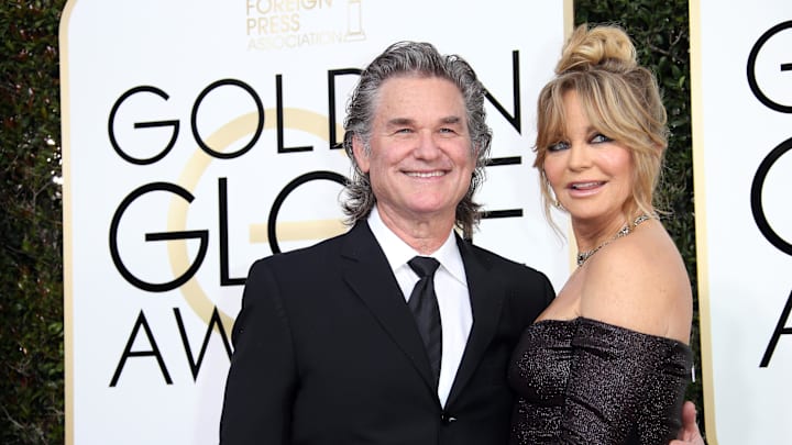 Jan 8, 2017; Beverly Hills, CA, USA; Kurt Russell, left and Goldie Hawn arrive for the 74th Golden