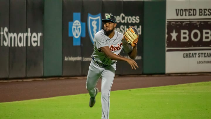 Detroit Tigers right-hander Dylan Smith warms up before pitching for the Salt River Rafters in the
