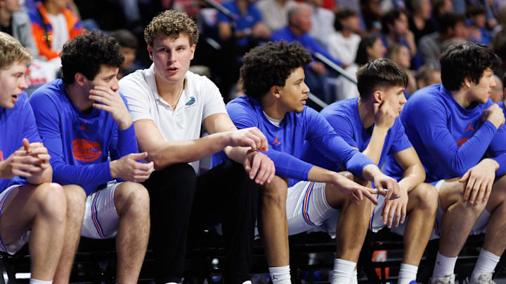 Jan 25, 2025; Gainesville, Florida, USA; Florida Gators center Micah Handlogten (3) sits on the bench in plain clothes against the Georgia Bulldogs during the first half at Exactech Arena at the Stephen C. O'Connell Center. Mandatory Credit: Matt Pendleton-Imagn Images