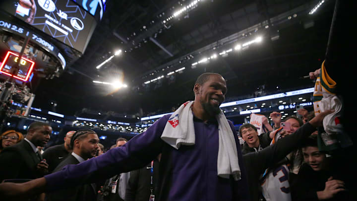 Jan 31, 2024; Brooklyn, New York, USA; Phoenix Suns forward Kevin Durant (35) smiles as he leaves the court after defeating the Brooklyn Nets at Barclays Center. Mandatory Credit: Brad Penner-Imagn Images