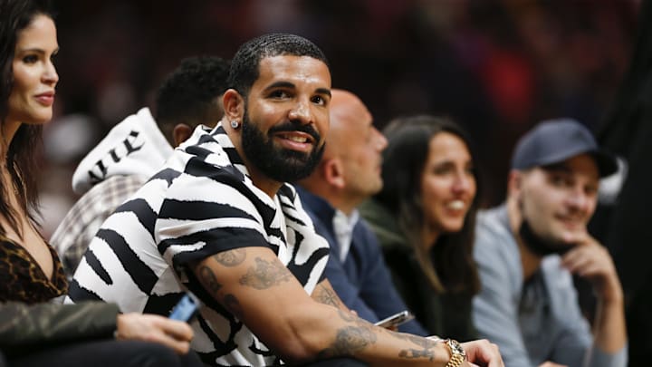 Jan 14, 2022; Miami, Florida, USA; Canadian rapper Drake attends the game between the Miami Heat and the Atlanta Hawks at FTX Arena. Mandatory Credit: Sam Navarro-Imagn Images