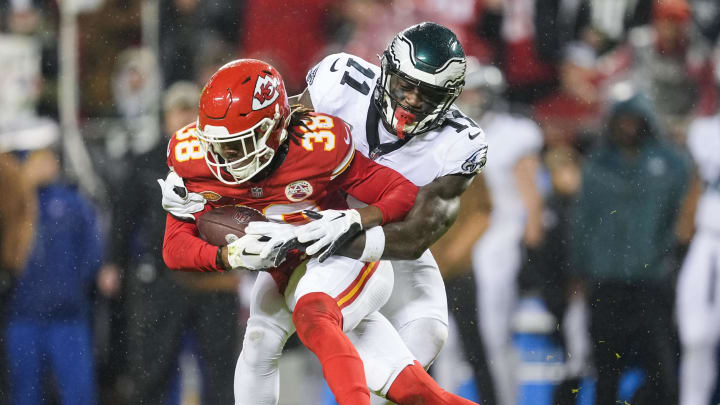Nov 20, 2023; Kansas City, Missouri, USA; Kansas City Chiefs cornerback L'Jarius Sneed (38) is tackled after intercepting a pass intended for Philadelphia Eagles wide receiver A.J. Brown (11) during the first half at GEHA Field at Arrowhead Stadium. Mandatory Credit: Jay Biggerstaff-USA TODAY Sports Nov 20, 2023; Kansas City, Missouri, USA; Kansas City Chiefs cornerback L'Jarius Sneed (38) is tackled after intercepting a pass intended for Philadelphia Eagles wide receiver A.J. Brown (11) during the first half at GEHA Field at Arrowhead Stadium. Mandatory Credit: Jay Biggerstaff-USA TODAY Sports