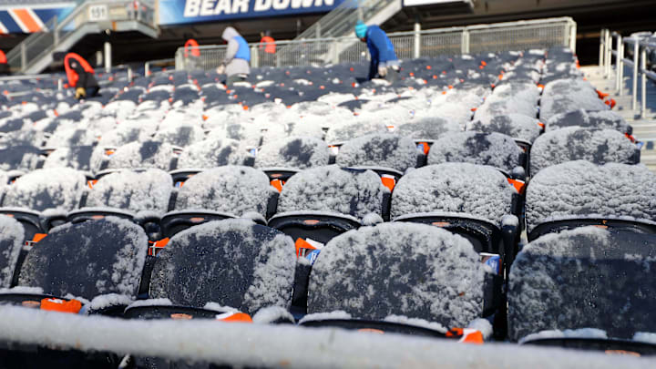 Nov 22, 2015; Chicago, IL, USA; A general view of stadium crew clearing snow prior to a game between the Chicago Bears and the Denver Broncos at Soldier Field. Mandatory Credit: Dennis Wierzbicki-Imagn Images