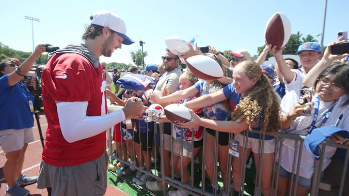 Josh Allen signs autographs for fans during the opening day of Buffalo Bills training camp.