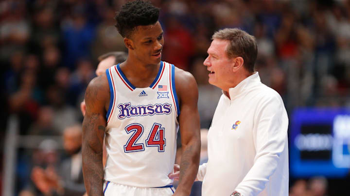 Kansas junior forward KJ Adams Jr. (24) exchanges words with coach Bill Self during the second half of Friday's game inside Allen Fieldhouse. Kansas junior forward KJ Adams Jr. (24) exchanges words with coach Bill Self during the second half of Friday's game inside Allen Fieldhouse.